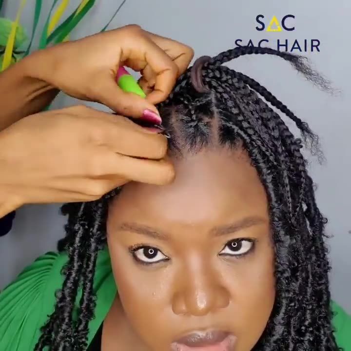 A lady crocheting her hair