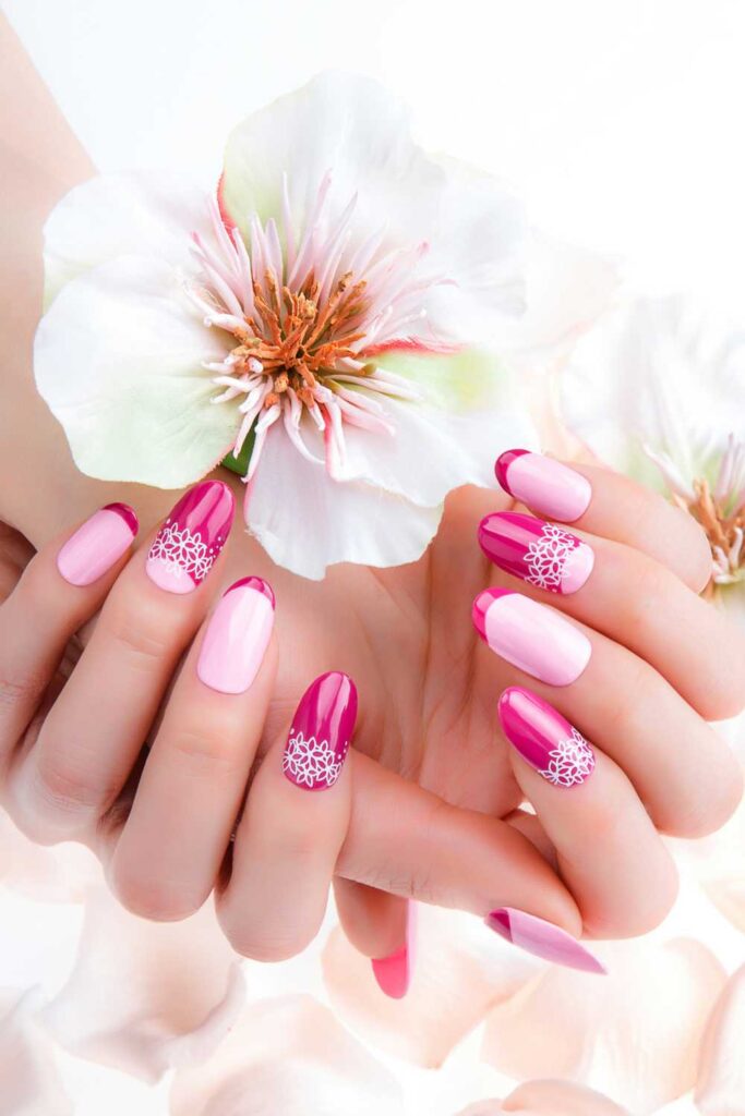 A hand with floral nails design

