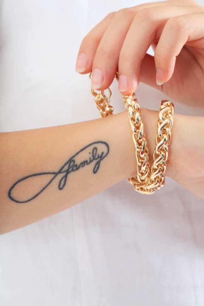Minimal tattoo design that feels so power with an infinity family design
