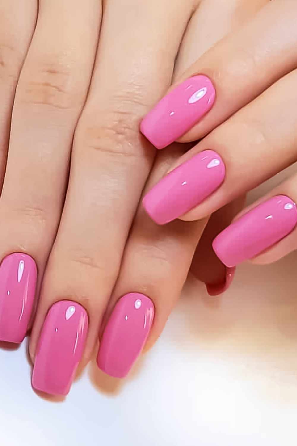 A picture of a bold plain pink nails