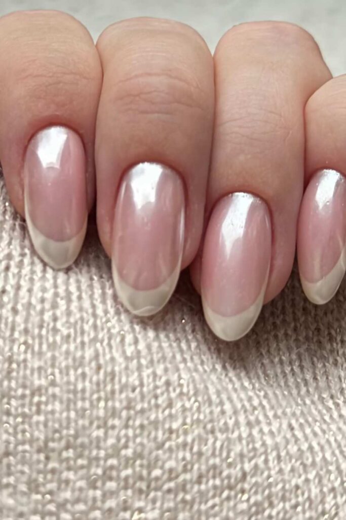 A picture of clean nude pink and silver color tips