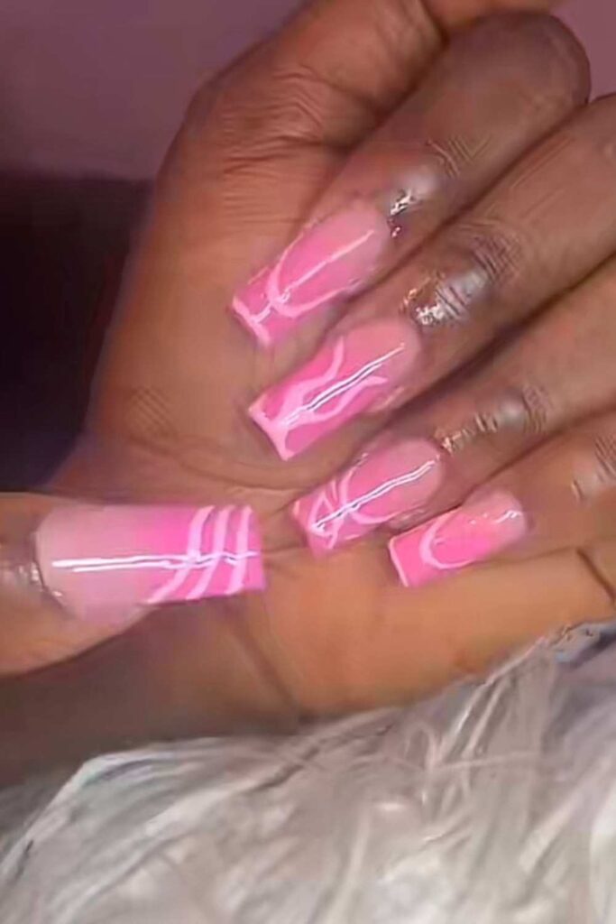 dark skin tone with baby pink nude nails design

