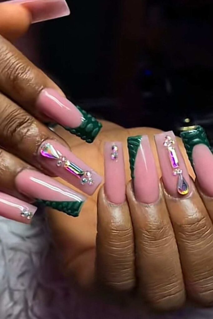 A picture of green French tips nail design