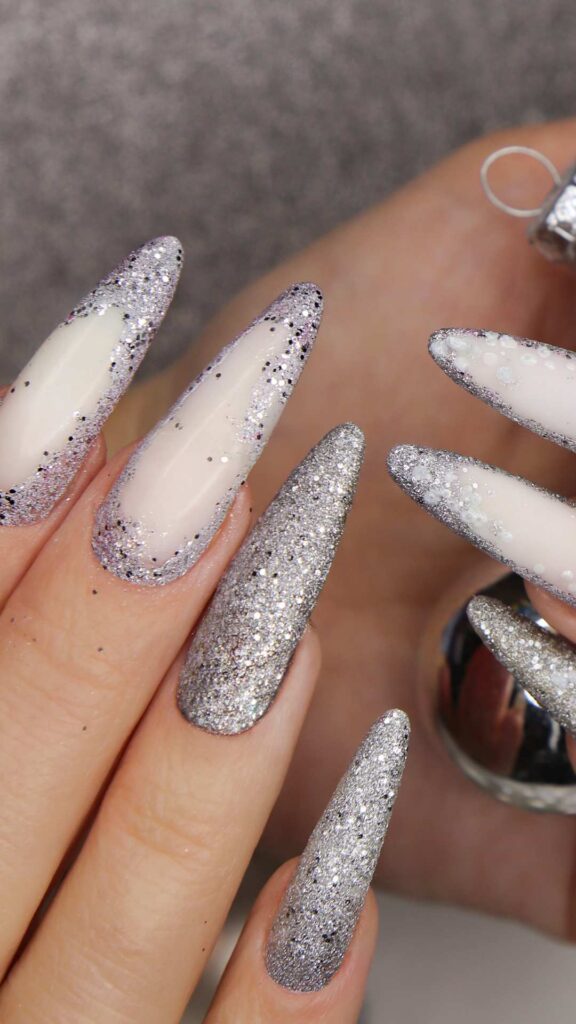 A long nails design with detailed art space in the middle of the design.