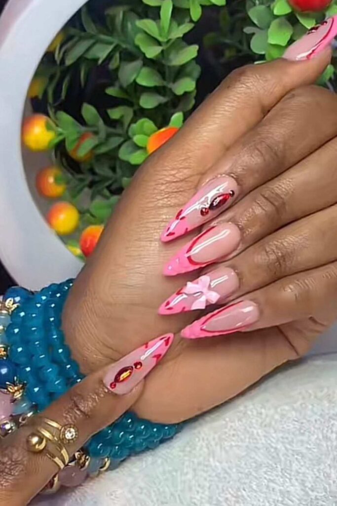medium skin tone with nude nail design with baby pink tips