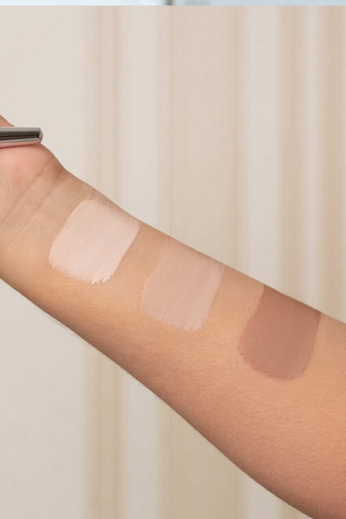 Matching the skin tone with different foundation shades.