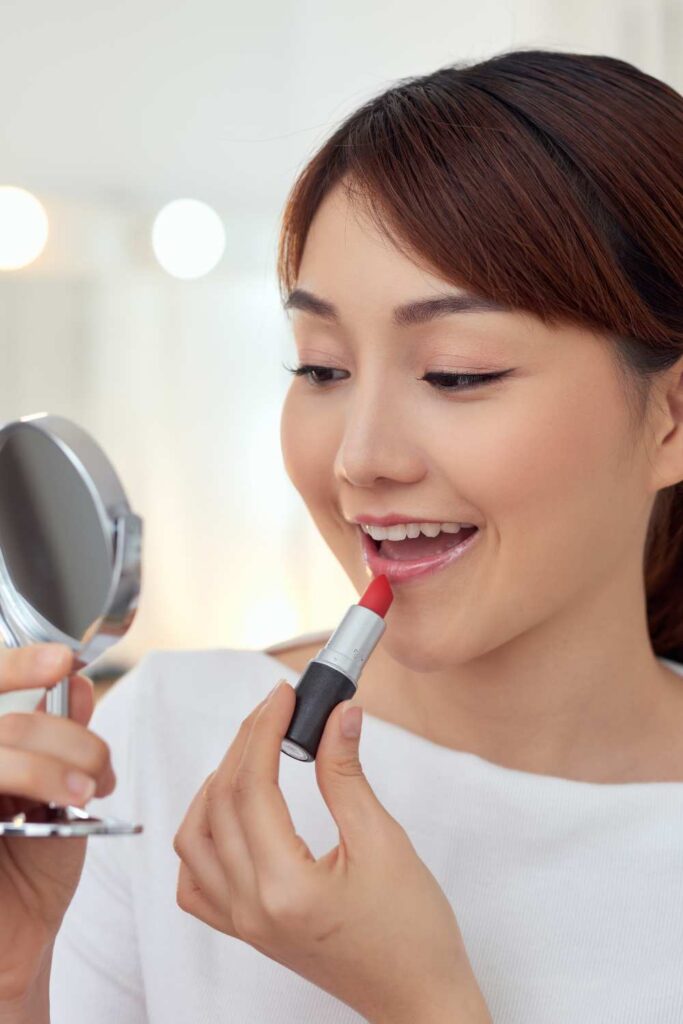 a lady applying of natural base makeup
