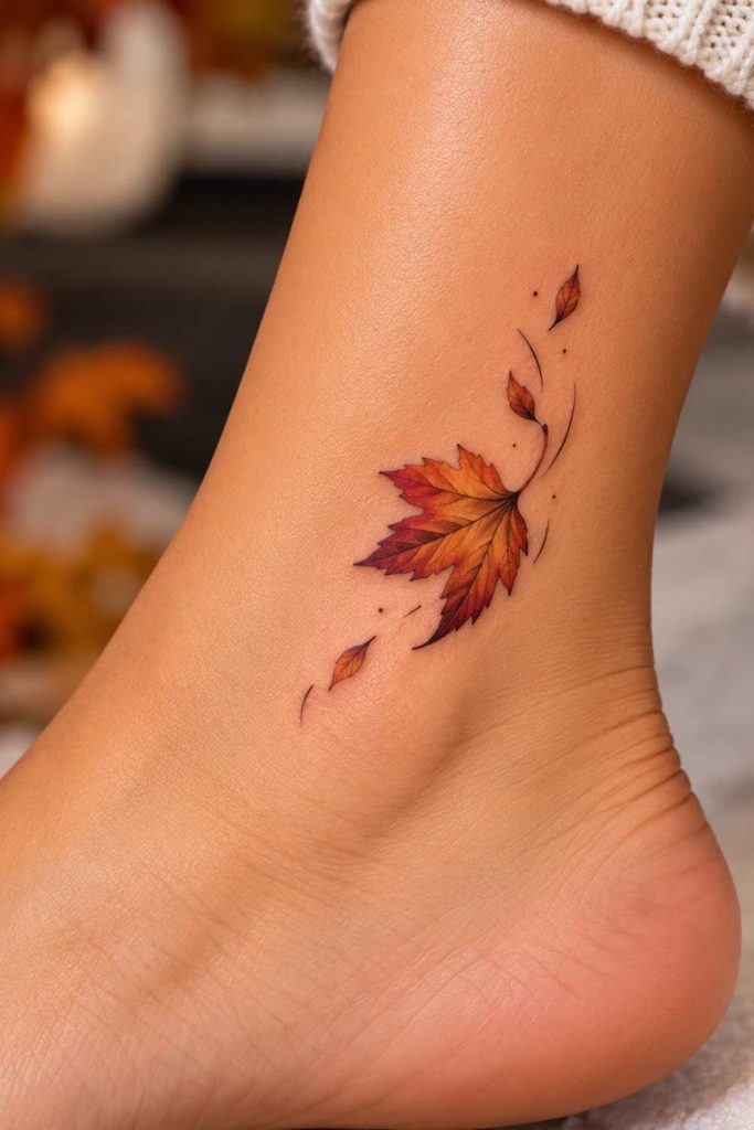 Single Falling autumn Leaf Tattoo